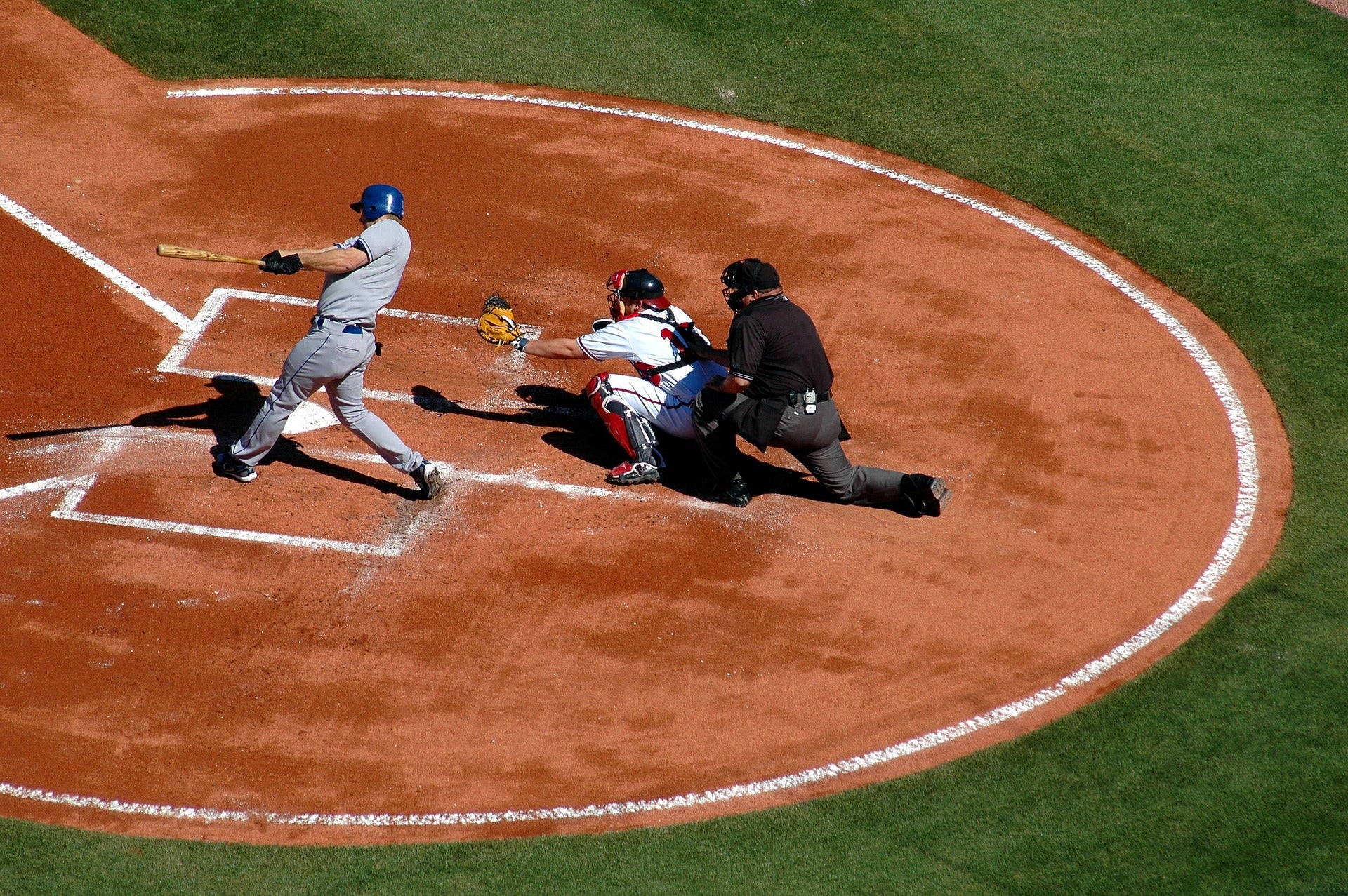 Baseball player hitting the ball