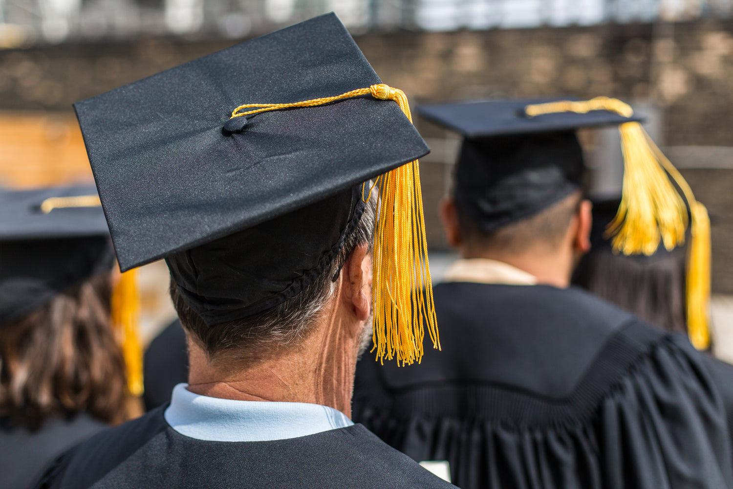 Grad student wearing a cap