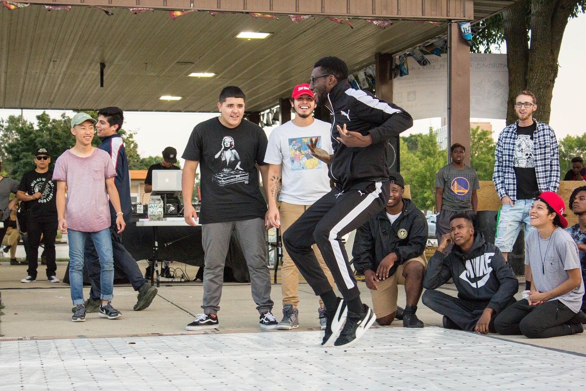 Man dancing in front of friends
